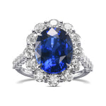 Oval Royal Blue Sapphire and Diamond Halo Ring