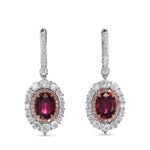 Orecchini a doppio alone con rubini ovali del Mozambico e diamanti
