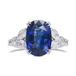 Royal Blue Oval Sapphire and Diamond Side Stone Ring