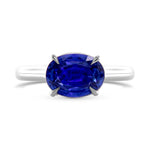 Oval Blue Sapphire and Diamond Hidden Halo Ring