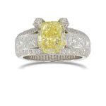 Extraordinary Fancy Yellow Cushion and Princess shape Diamond Ring