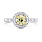 Fancy Yellow Round Diamond Halo Engagement Ring