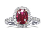 Oval Pigeon Blood Ruby and Diamond Halo Ring
