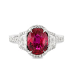 Oval Ruby Three-stone Halo Ring