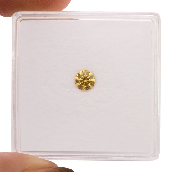 0.20 Carat Fancy Intense Yellow Orange Round Diamond SI2 GIA