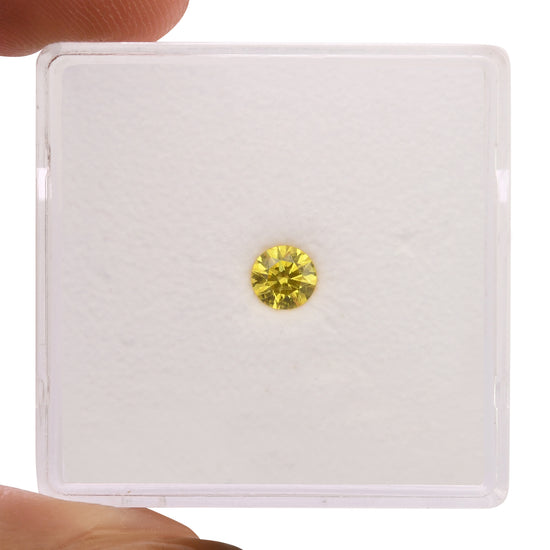 0.20 Carat Fancy Vivid Yellow Round Diamond SI1 GIA