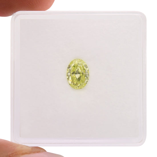0.52 Carat Fancy Yellow Green Oval Diamond SI1 GIA