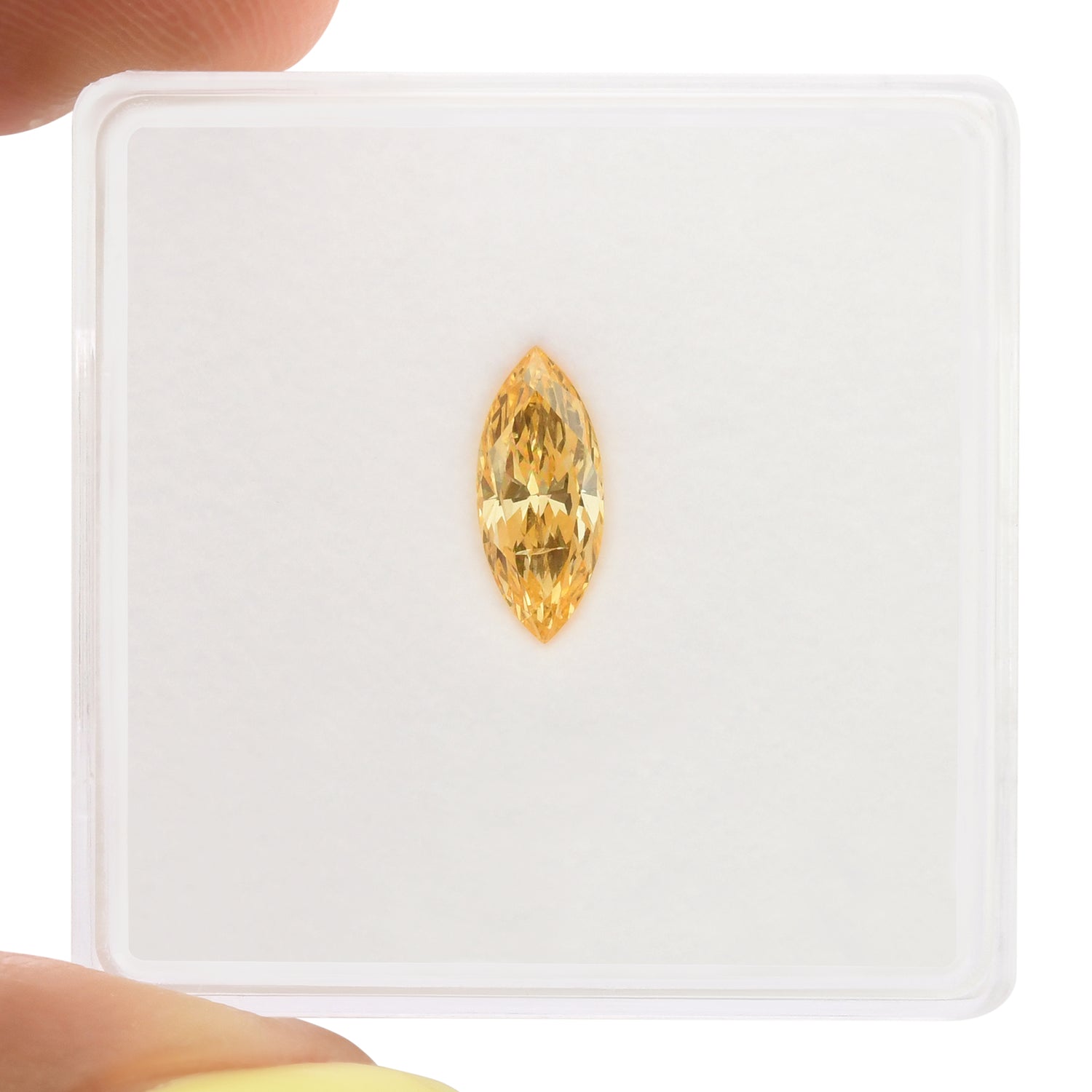 0.54 Carat Fancy Intense Yellowish Orange Marquise Diamond I1 GIA