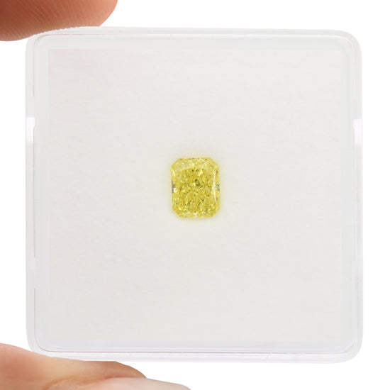 0.54 Carat Fancy Intense Yellow Radiant Diamond VVS2 GIA
