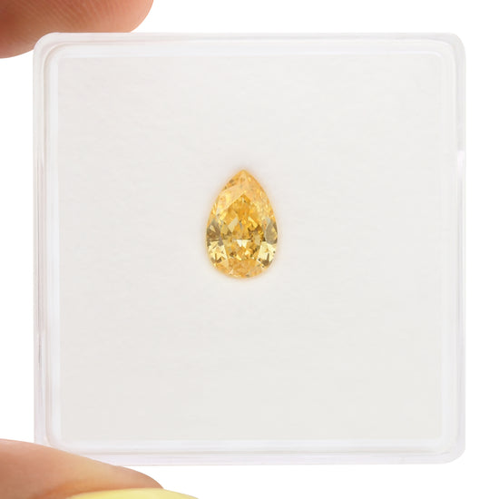 0.56 Carat Fancy Intense Yellow Orange Pear Diamond SI2 GIA