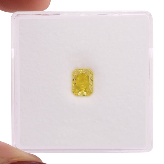 0.57 Carat Fancy Vivid Yellow Radiant Diamond FL GIA