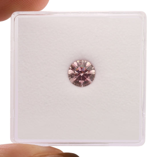 0.63 Carat Fancy Intense Purplish Pink Round Diamond I1 GIA
