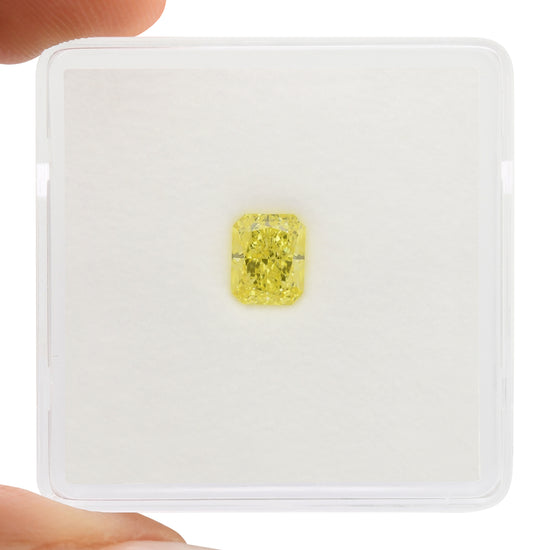 0.63 Carat Fancy Intense Yellow Radiant Diamond VS2 GIA