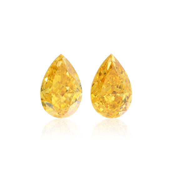 Diamanti a goccia da 0,64 carati Fancy Vivid Orange Yellow SI1 GIA