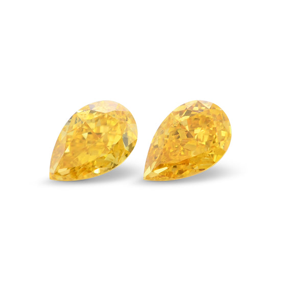 Diamanti a goccia da 0,64 carati Fancy Vivid Orange Yellow SI1 GIA
