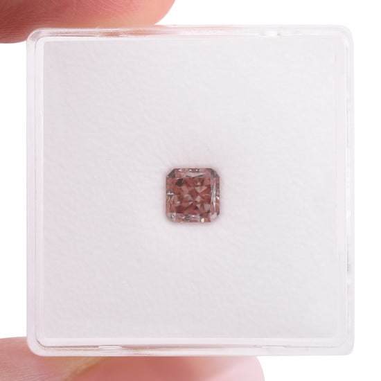 0.65 Carat Fancy Orangy Pink Radiant Diamond SI2 GIA
