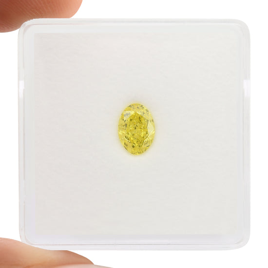 0.65 Carat Fancy Vivid Yellow Oval Diamond VS1 GIA