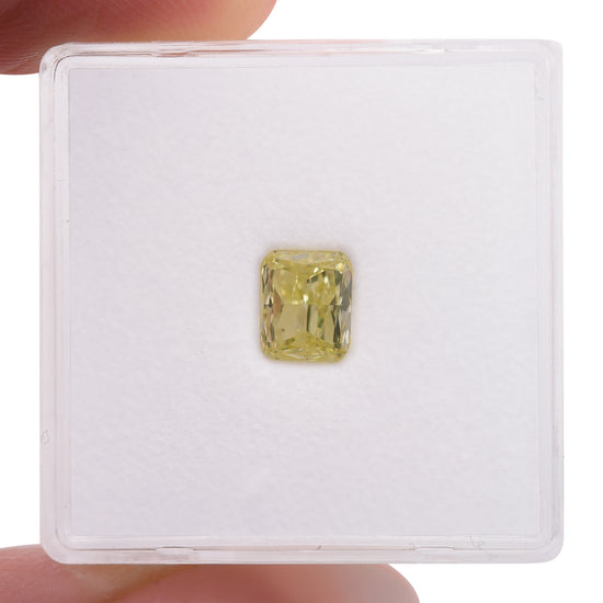 0.68 Carat Fancy Yellow Cushion Diamond VVS2 GIA