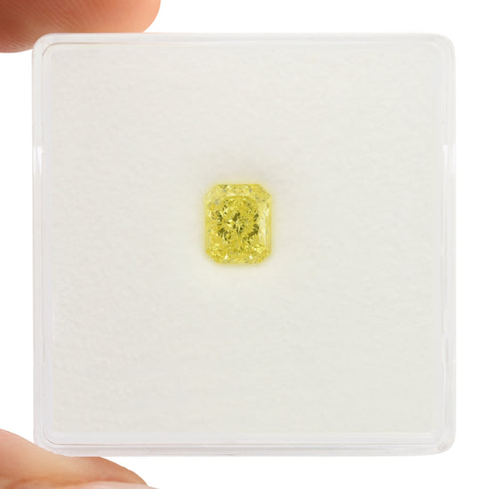 0.70 Carat Fancy Intense Yellow Radiant Diamond VVS1 GIA