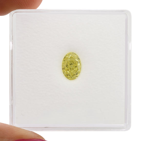 0.70 Carat Fancy Yellow Oval Diamond VVS2 GIA
