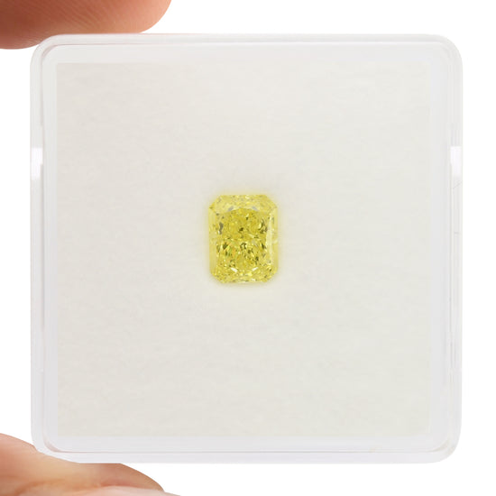0.75 Carat Fancy Intense Yellow Radiant Diamond VVS2 GIA