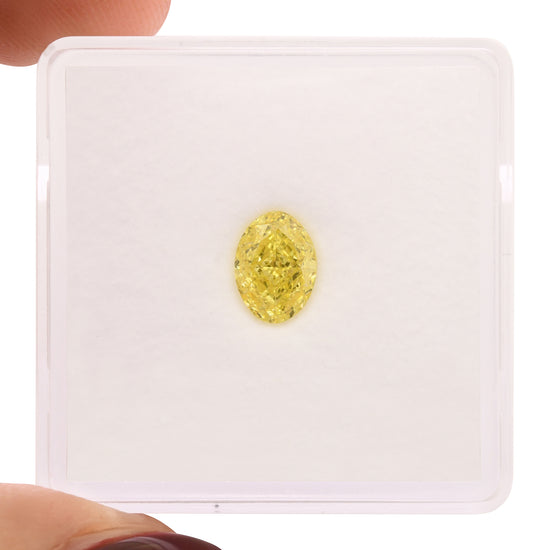 0.82 Carat Fancy Intense Yellow Oval Diamond VVS2 GIA