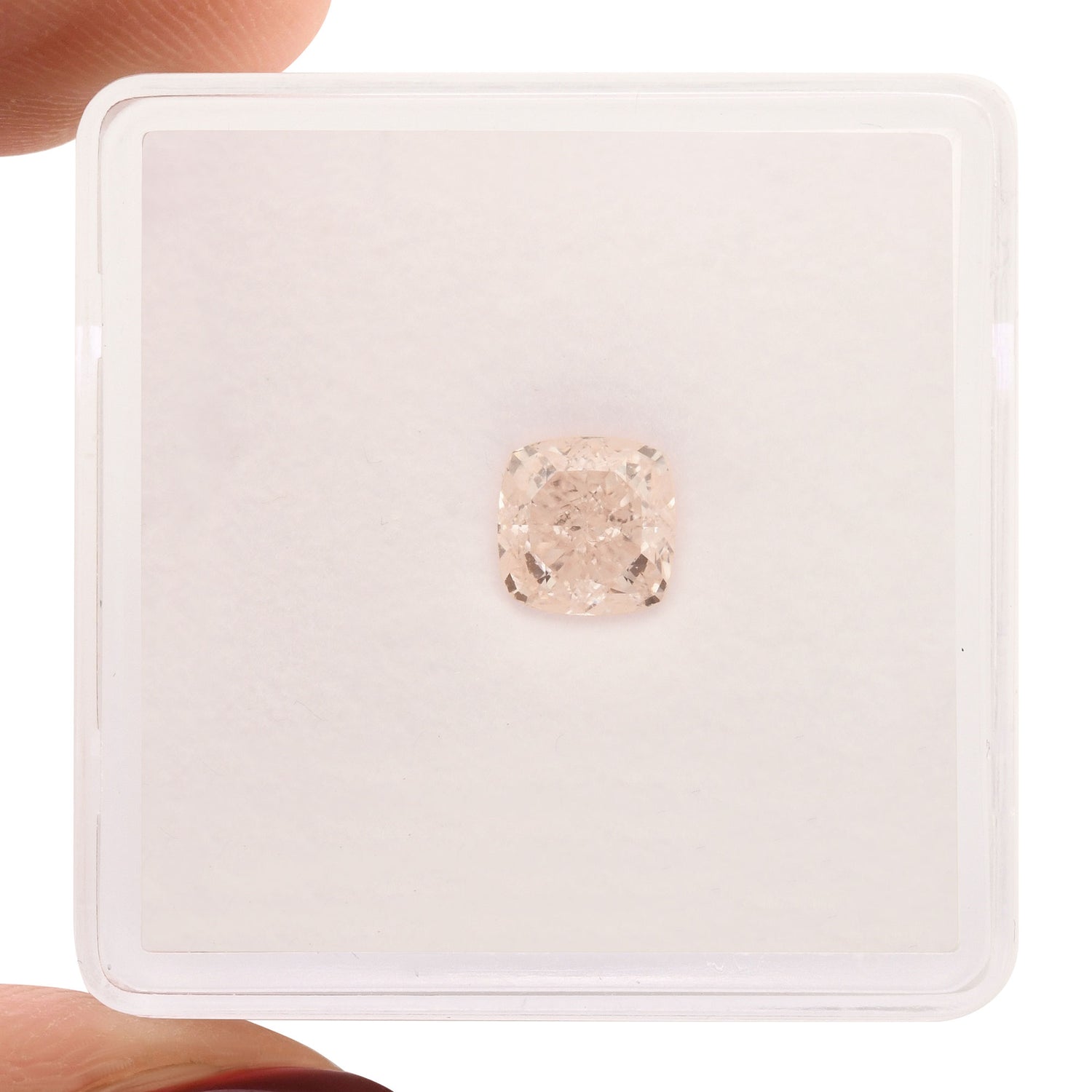 0.86 Carat Fancy Light Orangy Pink Cushion Diamond VVS1 GIA
