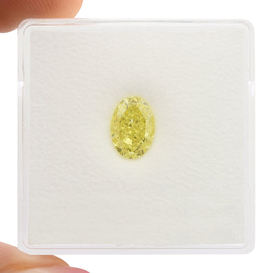 1.08 Carat Fancy Yellow Oval Diamond VVS2 GIA