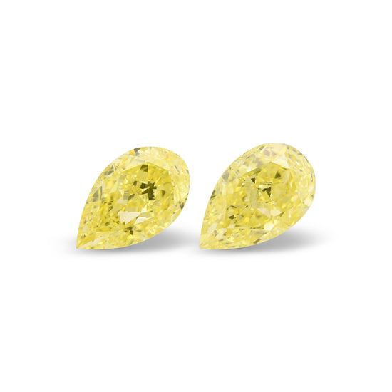1.09 Carat Fancy Intense Yellow Pear Diamonds VS2 And VS2 GIA Pair