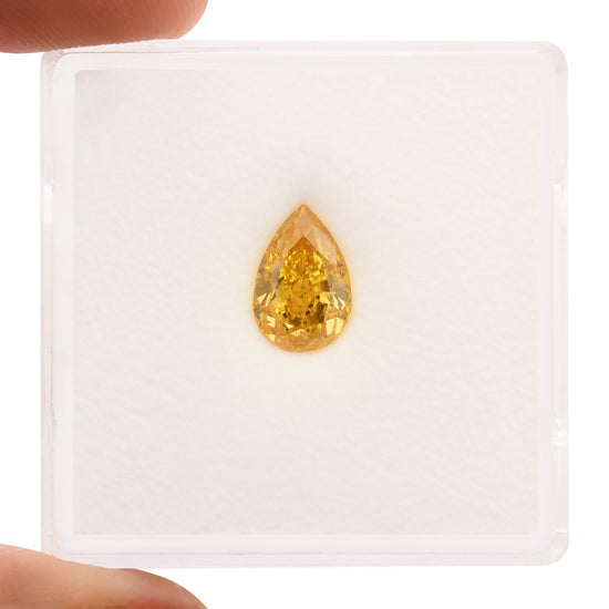 1.10 Carat Fancy Vivid Orange Yellow Pear Diamond GIA (I1)