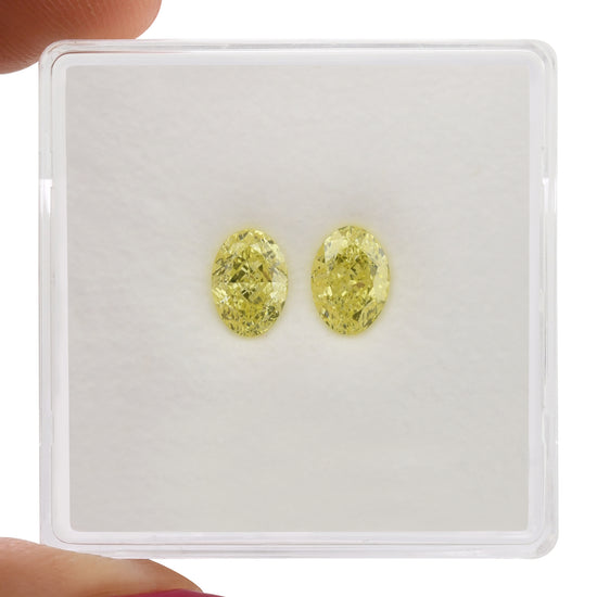 1.11 Carat Fancy Yellow Oval Diamonds VVS2 GIA