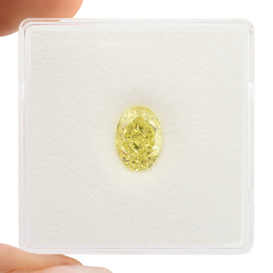 1.24 Karat Fancy Yellow Oval Diamant VS2 GIA