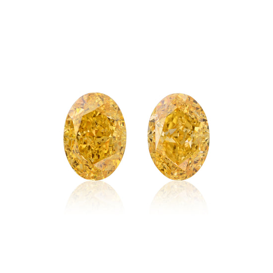 1.49 Carat Fancy Vivid Orange Yellow Oval Diamonds VS2 and VVS2 GIA Pair