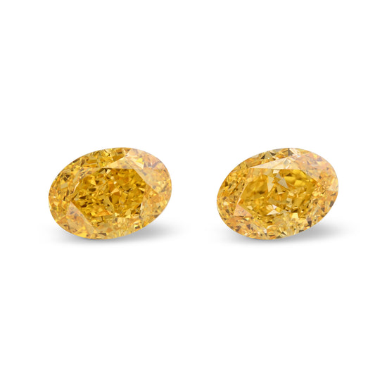1.49 Carat Fancy Vivid Orange Yellow Oval Diamonds VS2 and VVS2 GIA Pair