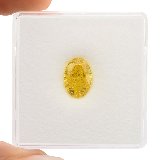 1,52 Karat Fancy Vivid Orangy Yellow Oval Diamant VVS2 GIA