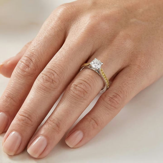 White F Colored Brilliant Cut Diamond Side-stone Ring