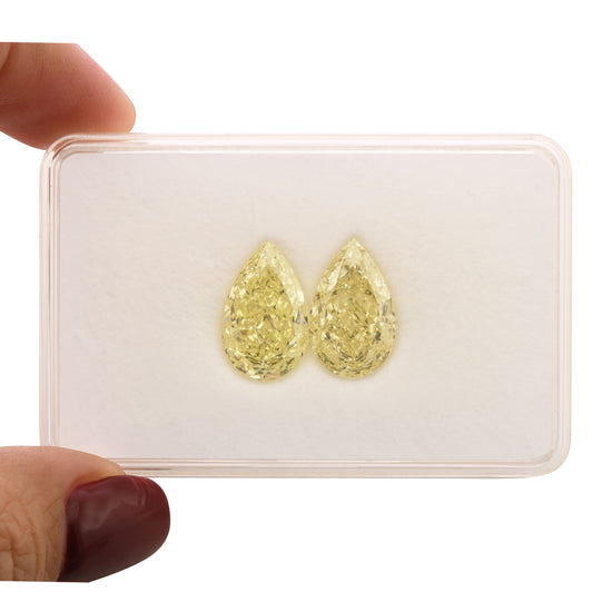 12.06 Carat Light Yellow Pear Diamonds VS1 GIA Pair