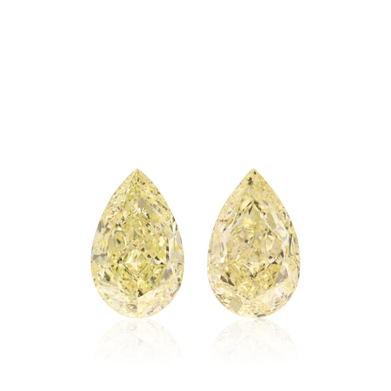 زوج من الماسات على شكل كمثرى بلون أصفر فاتح، 12.06 قيراط، درجة نقاء VS1، معتمد من GIA