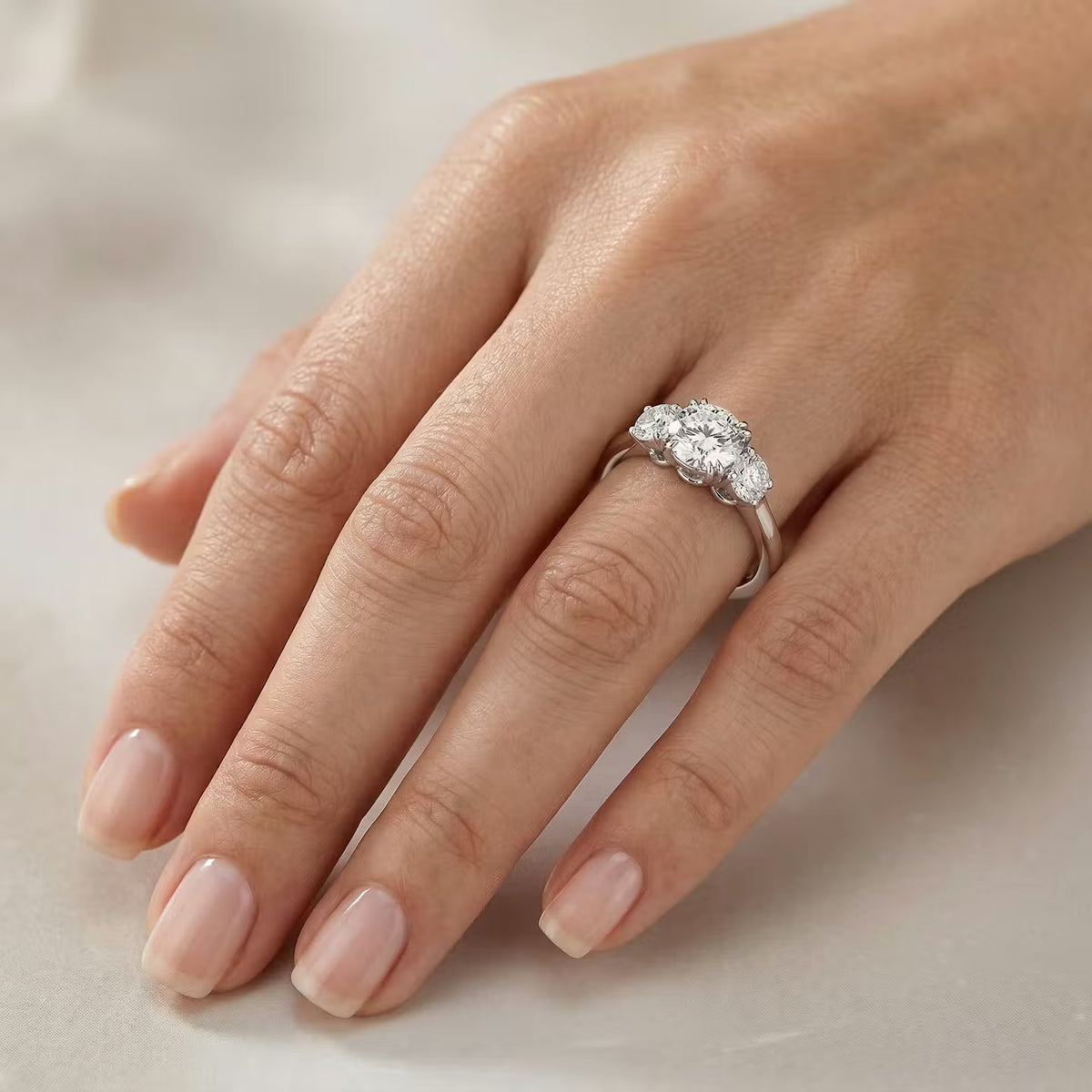 Engagement Rings Colorless Round Colorless Diamond Three-stone Engagement Ring | LEIBISH