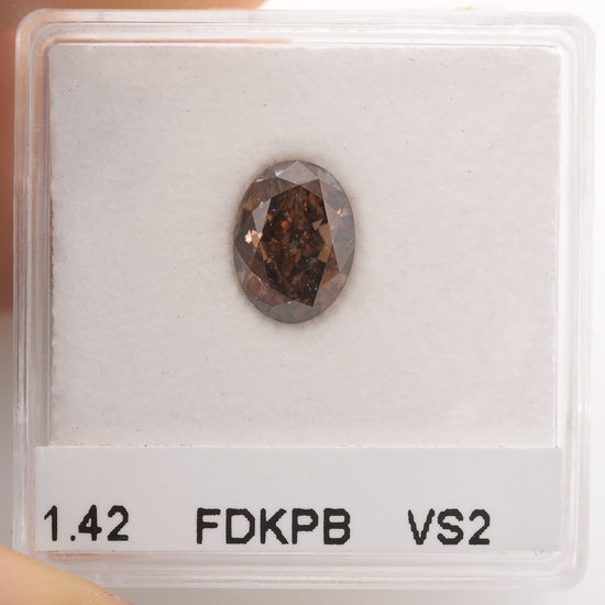 1.42 Carat Fancy Dark Pink Brown Oval Diamond VS2 GIA