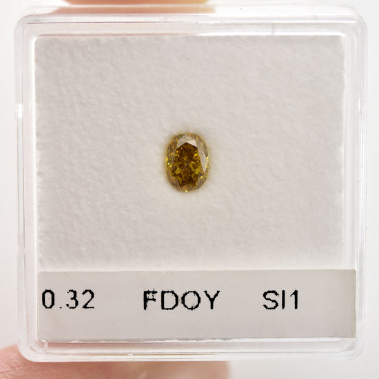 0.32 Carat Fancy Deep Orange Yellow Oval Diamond SI1 GIA