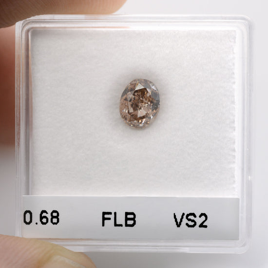 0.68 Carat Fancy Light Brown Oval Diamond VS2 GIA