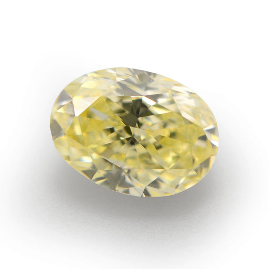 0.34 Carat Fancy Yellow Oval Diamond VVS2 IGI