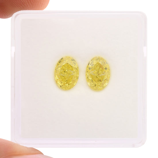 2.01 Carat Fancy Intense Yellow Oval Diamonds VS2 GIA Pair