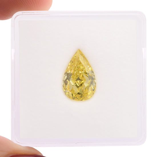 2.01 Karat Fancy Vivid Yellow Tropfenschliff Diamant VS1 GIA