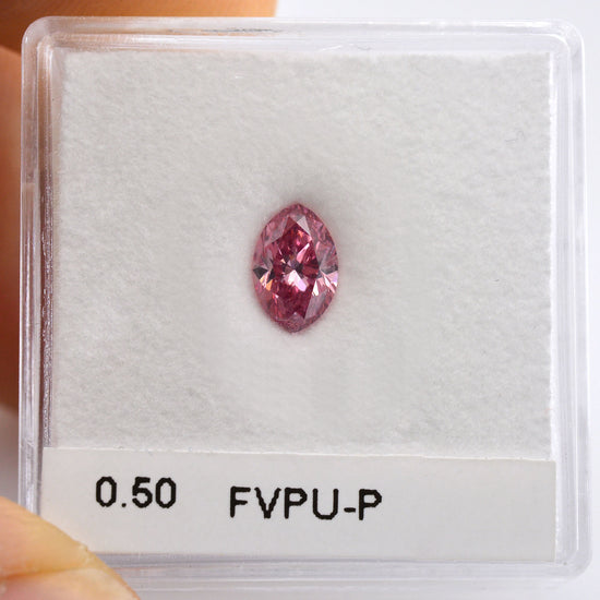 0.50 Carat Fancy Vivid Purplish Pink Marquise Diamond (SI2) GIA