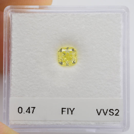 0.47 Carat Fancy Intense Yellow Radiant Diamond VVS2 IGI