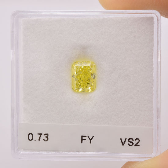 0.73 Carat Fancy Yellow Radiant Diamond VS2 GIA