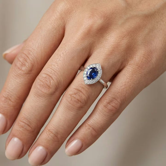 Oval Sapphire and Diamond Halo Ring
