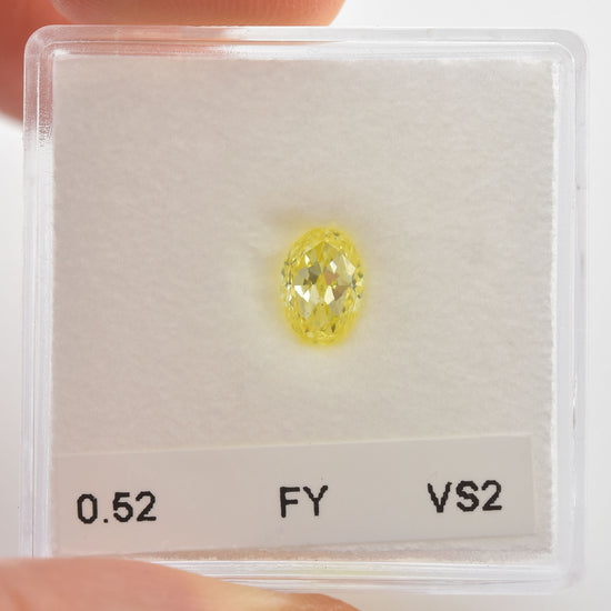 0.52 Carat Fancy Yellow Oval Diamond VS2 IGI